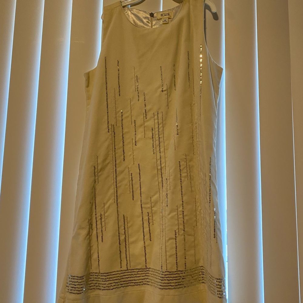 White kid’s dress